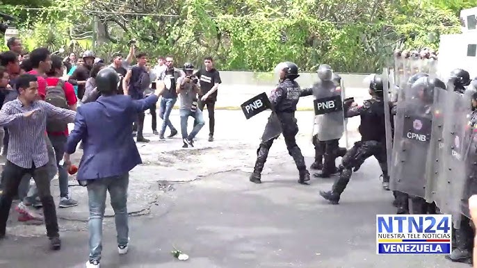 Tropas de la Policía Nacional y del Ejército dispersan a bombasos y chorros de agua marcha patriótica a favor dominicanidad